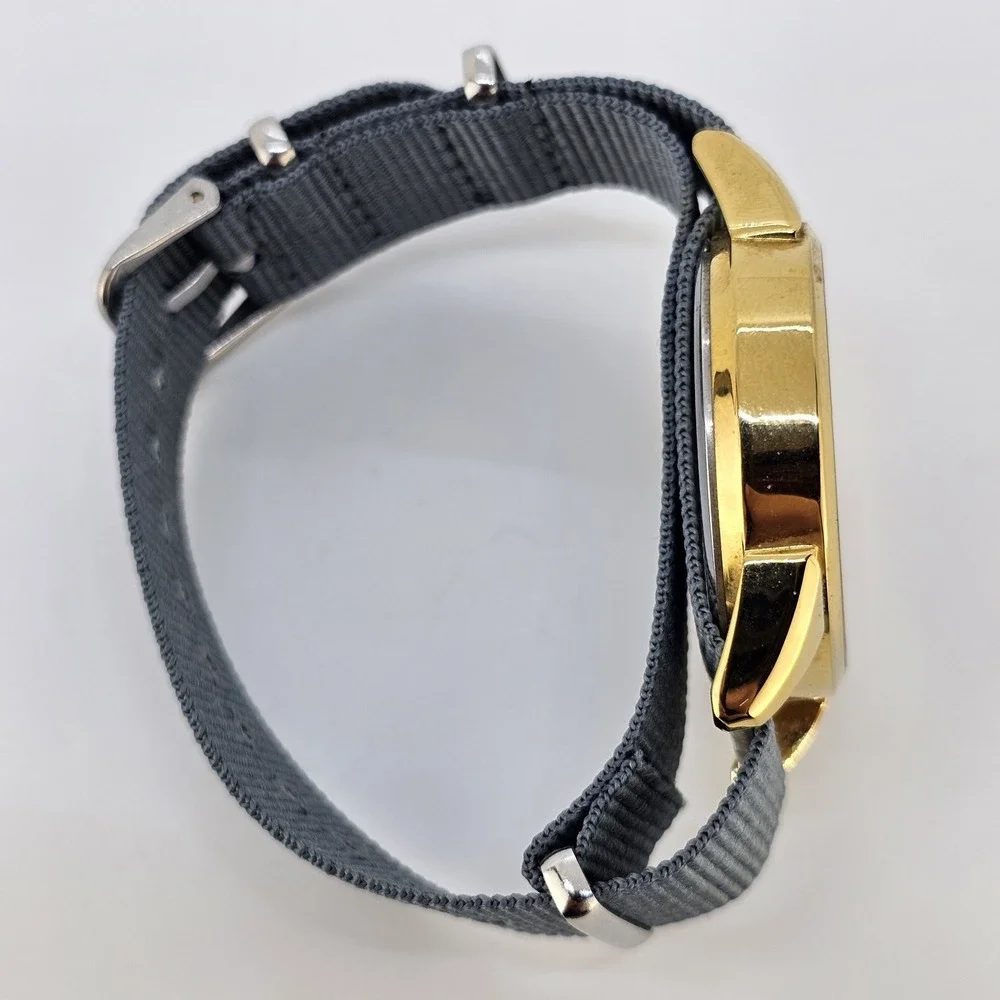 Men's Analog Watch 38MM Black Dial Day Date NEW Gray Canvas Band NEW Battery